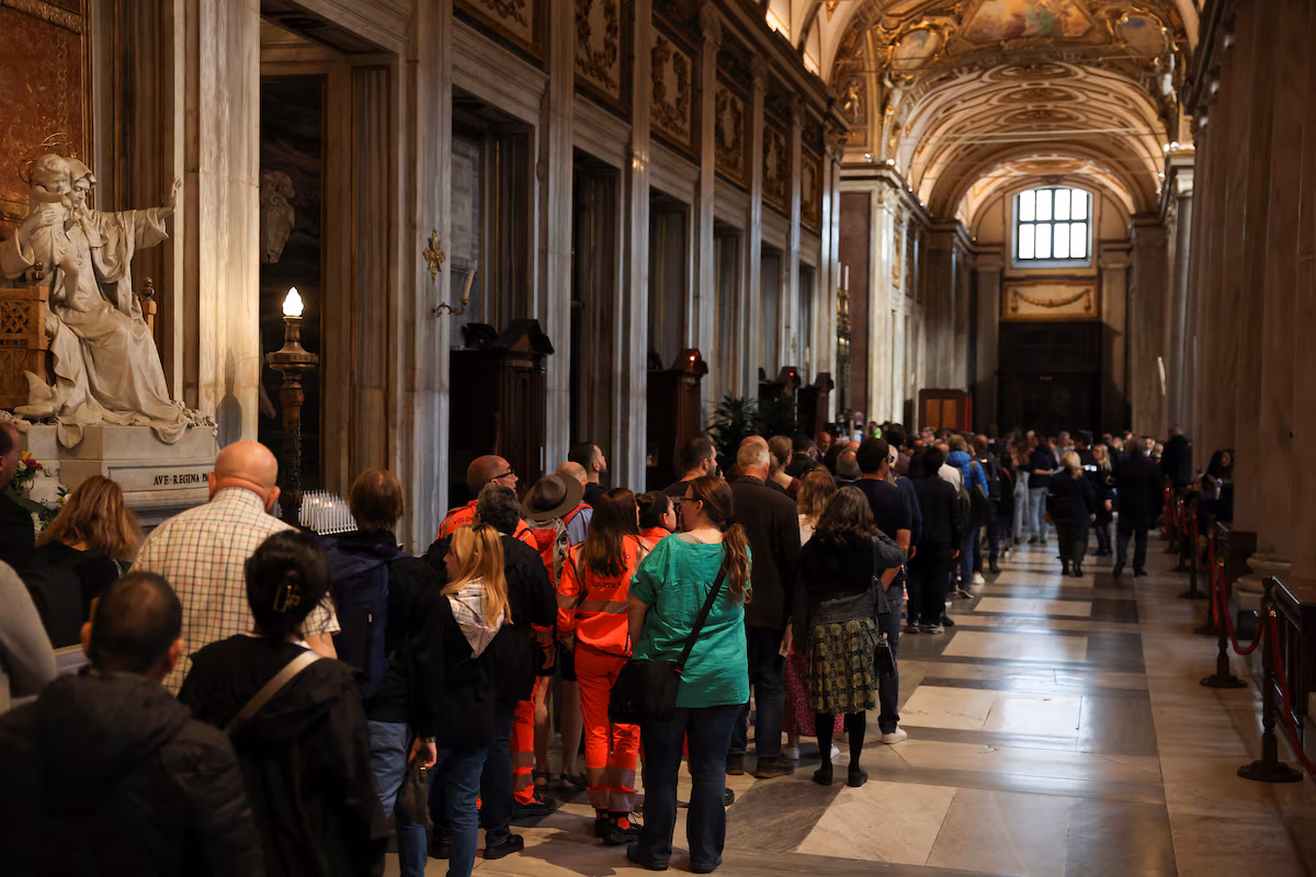 People queue to visit the tomb of the late Pope Francis in the Papal Basilica of Saint Mary Major (Santa Maria Maggiore), in Rome, Italy, April 27, 2025.