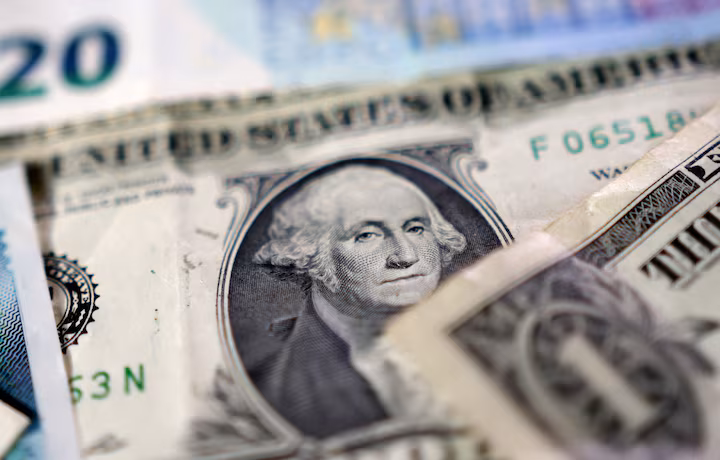 Dollar Holds Defensive Position as Traders Eye Trump’s Tax Bill and G7 Currency Talks