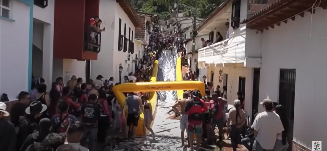 Colombian Village Transforms Main Street into Giant Slide in Daring Community Initiative