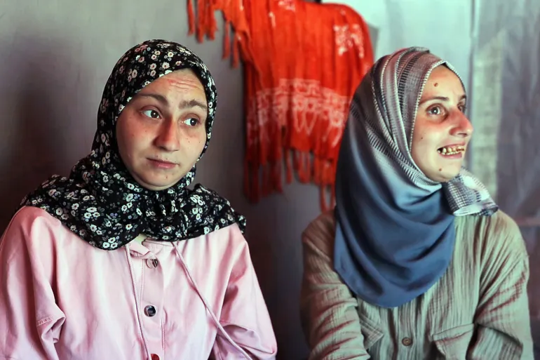 Disabled Gaza Sisters Endure Mounting Hardship Amid Ongoing Israeli Offensive